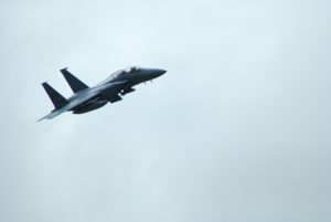 military jet flying in clouds submitted by airplane accident lawyers